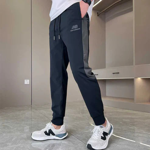 New Balance - Pantaloni ad asciugatura rapida per uomo