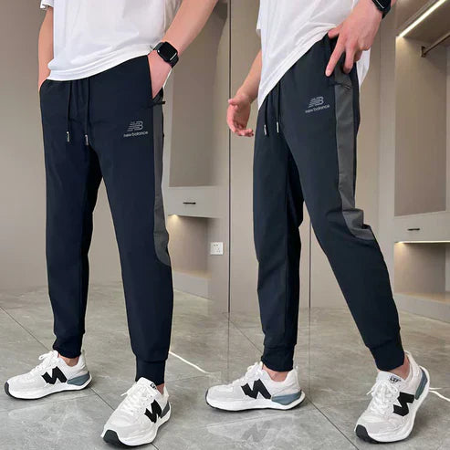 New Balance - Pantaloni ad asciugatura rapida per uomo
